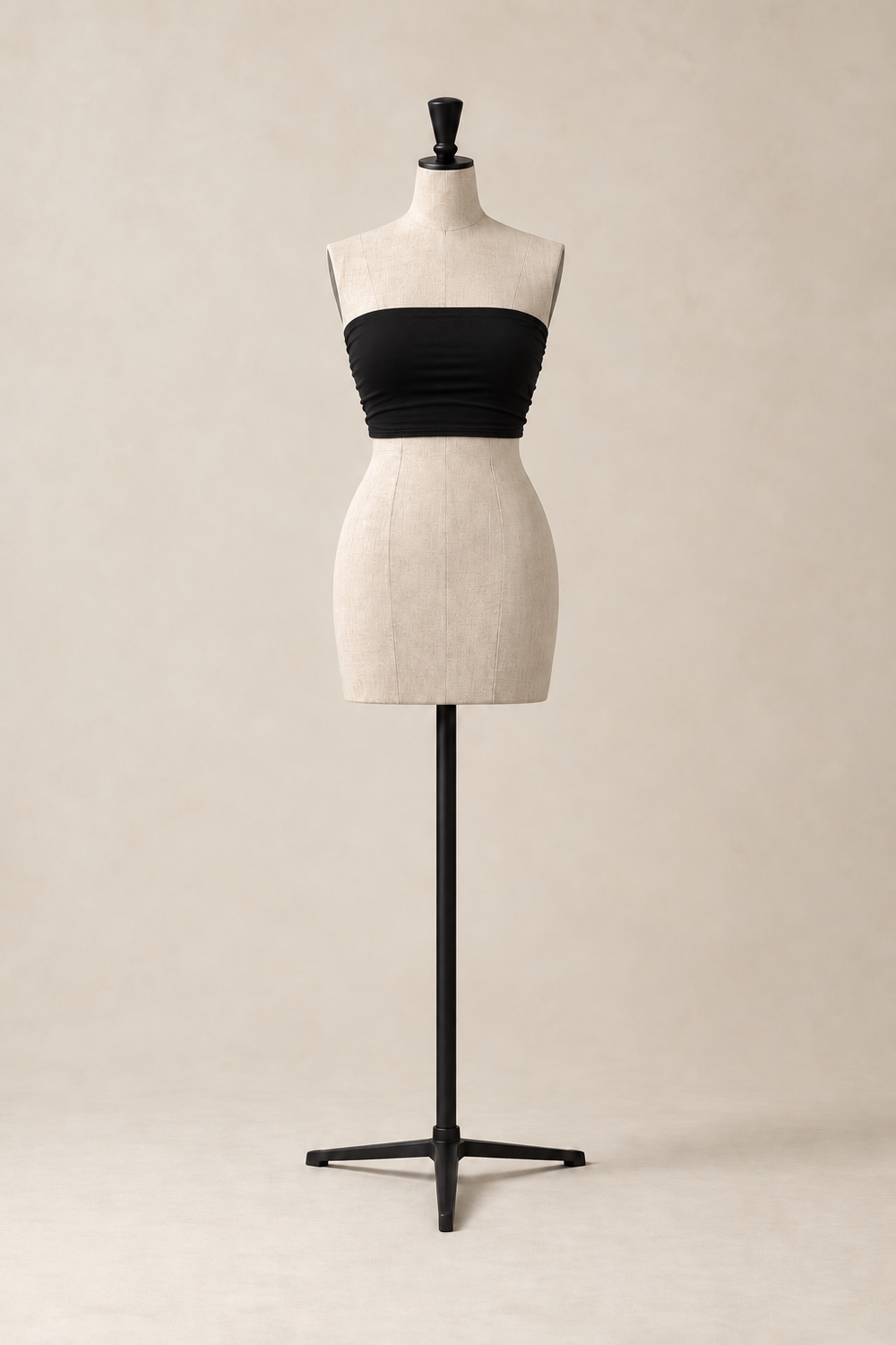 Fascia in Black, front view on a mannequin of the strapless tube top in fluid viscose, made in Italy by The Ethos Studio