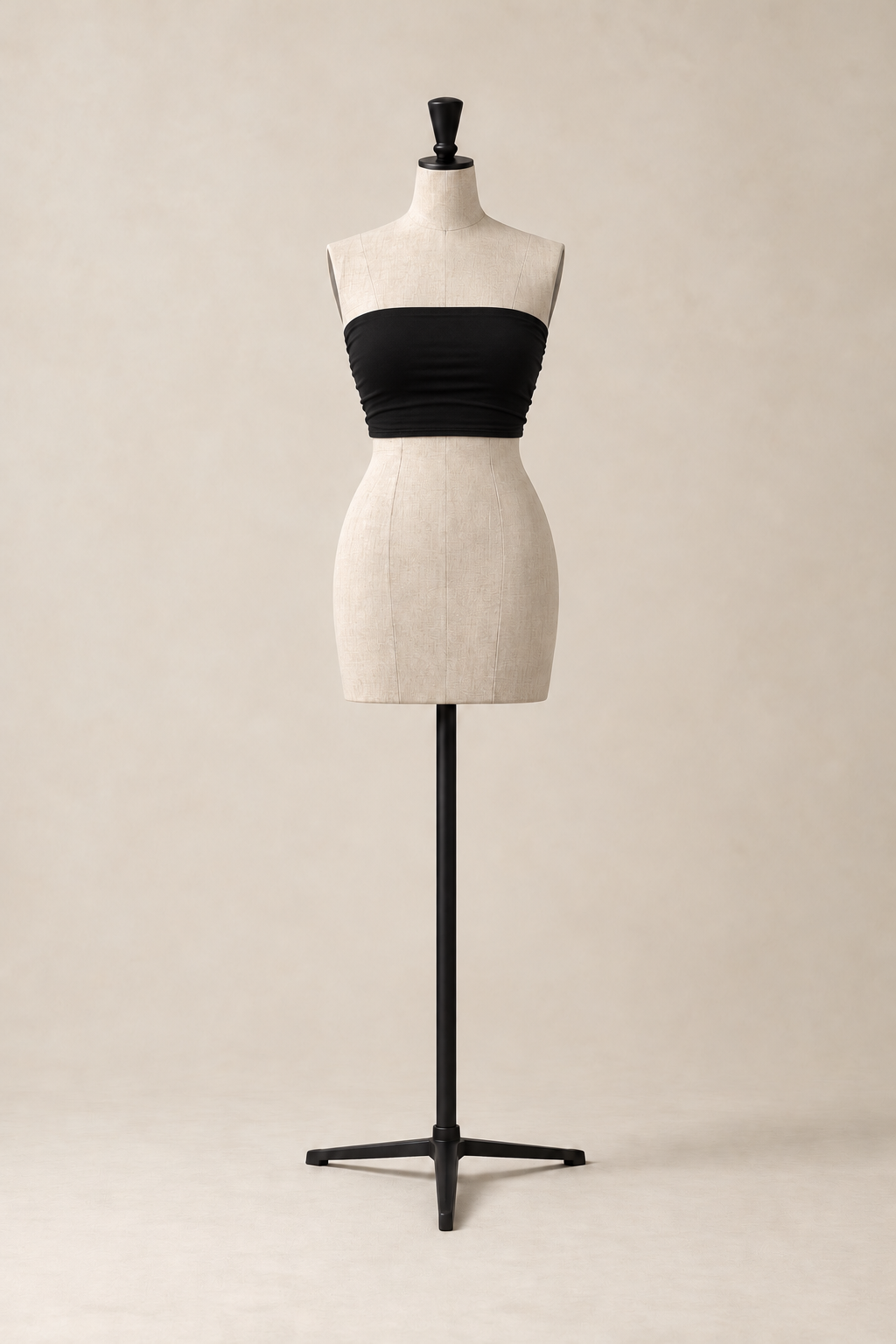 Fascia in Black, front view on a mannequin of the strapless tube top in fluid viscose, made in Italy by The Ethos Studio