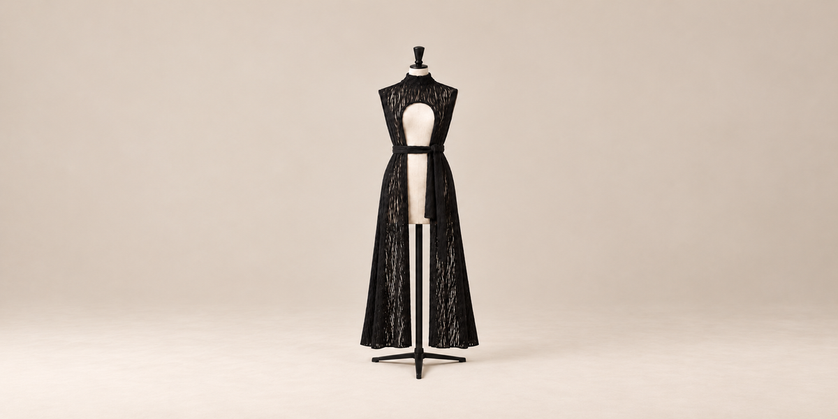 Maria Waistcoat-Cape, sleeveless semi-sheer waistcoat-cape with a high neckline, front cut-out and adjustable belt, made in Italy by The Ethos Studio