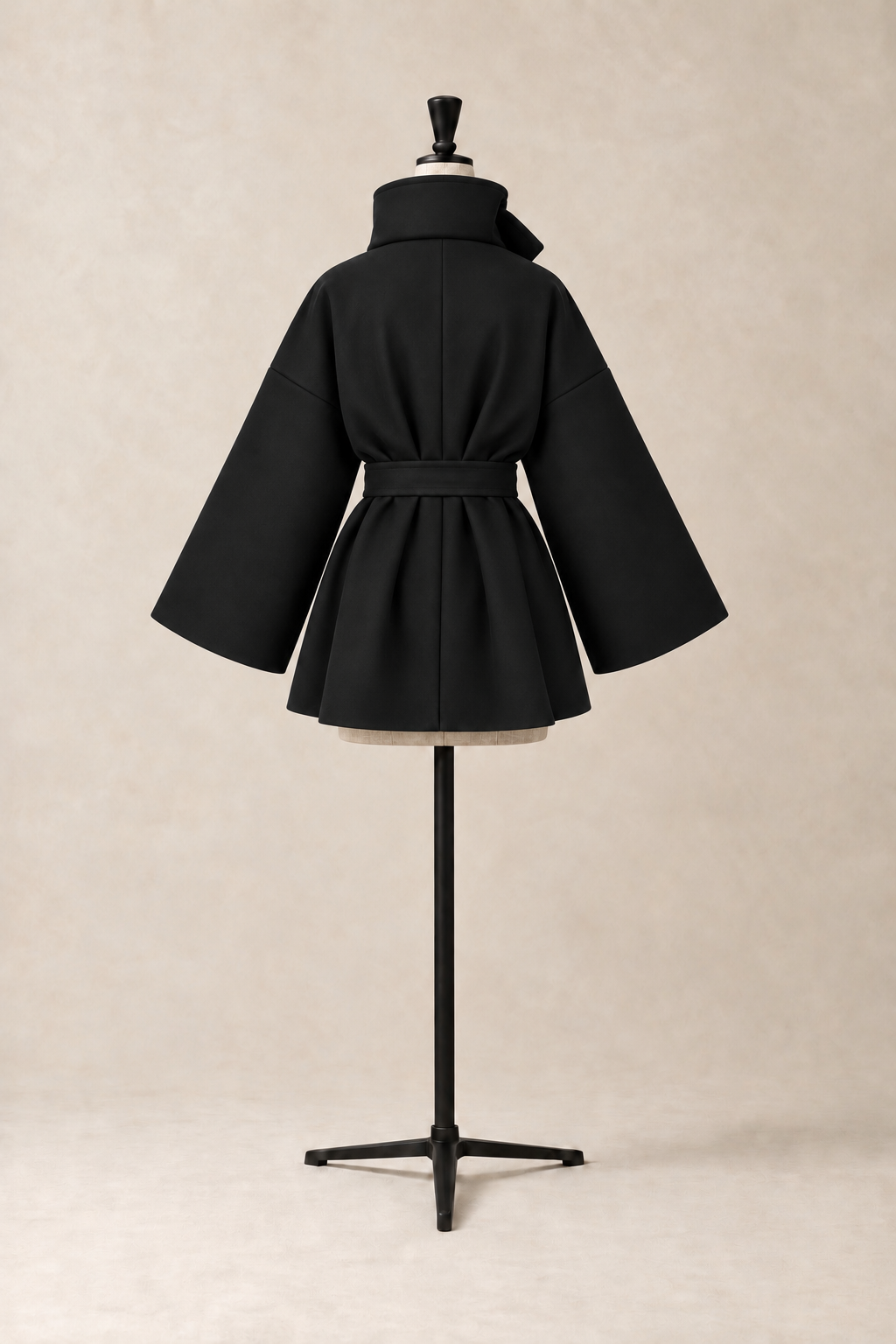 Nocturne Coat, oversized belted wool coat ending mid-thigh in a pointed asymmetric hem, made in Italy by The Ethos Studio