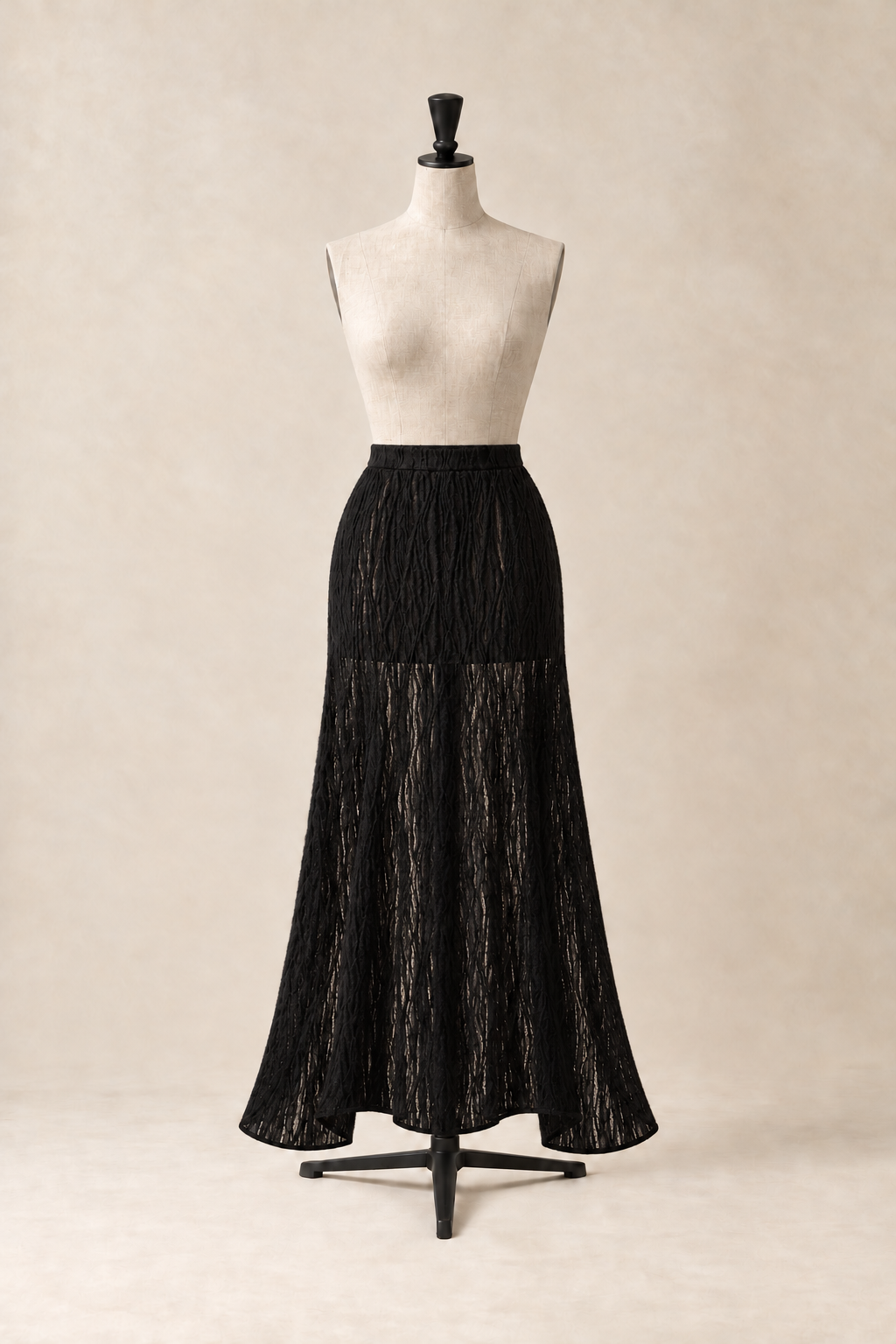 SoHo Skirt, midi A-line skirt in sheer rippled lace with a pointed handkerchief hem, made in Italy by The Ethos Studio